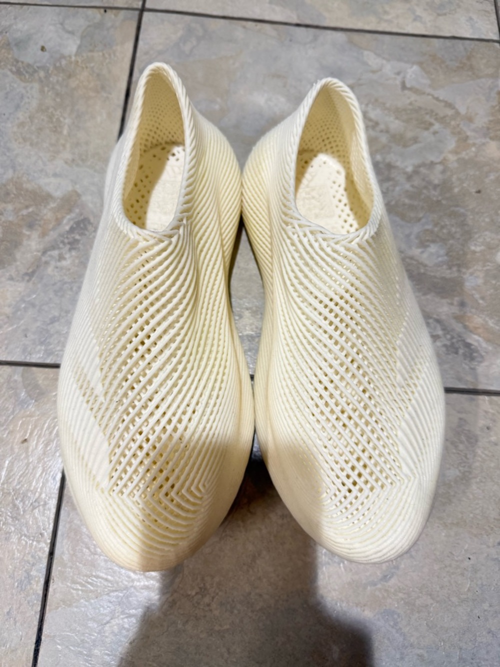 adidas Women’s Slip-On Knit Sneakers in Cream